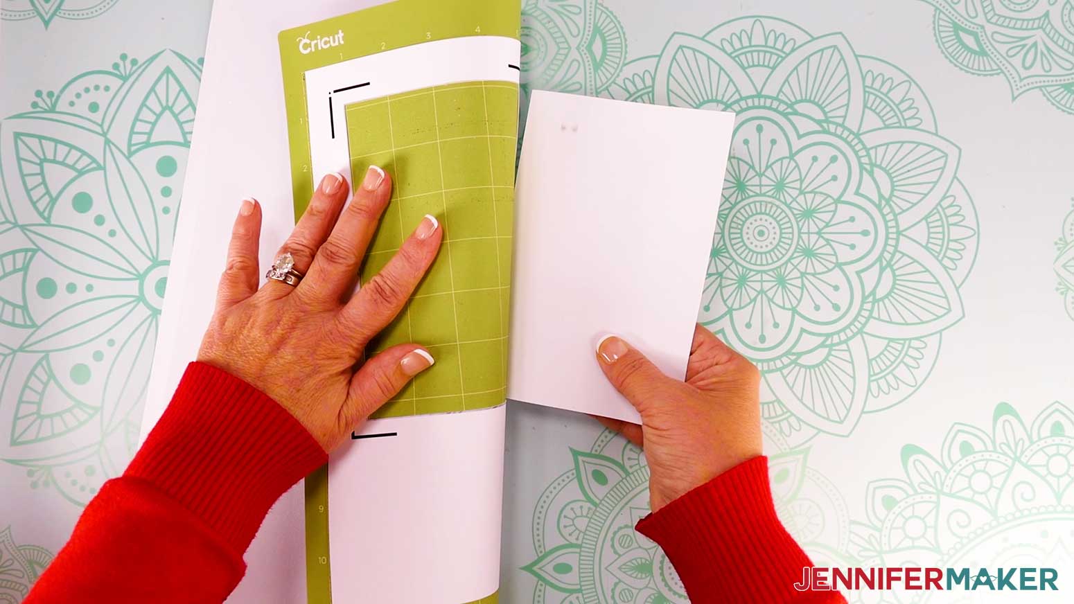 When the cuts are complete, unload the mat, flip it over onto your work surface, and roll it back to release the photo paper.