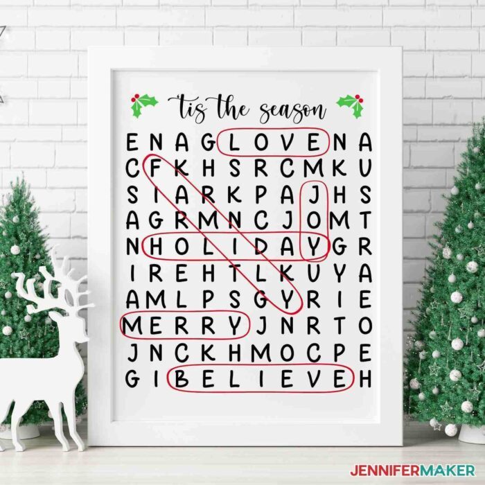 Picture frame word search next to mini Christmas trees and white deer