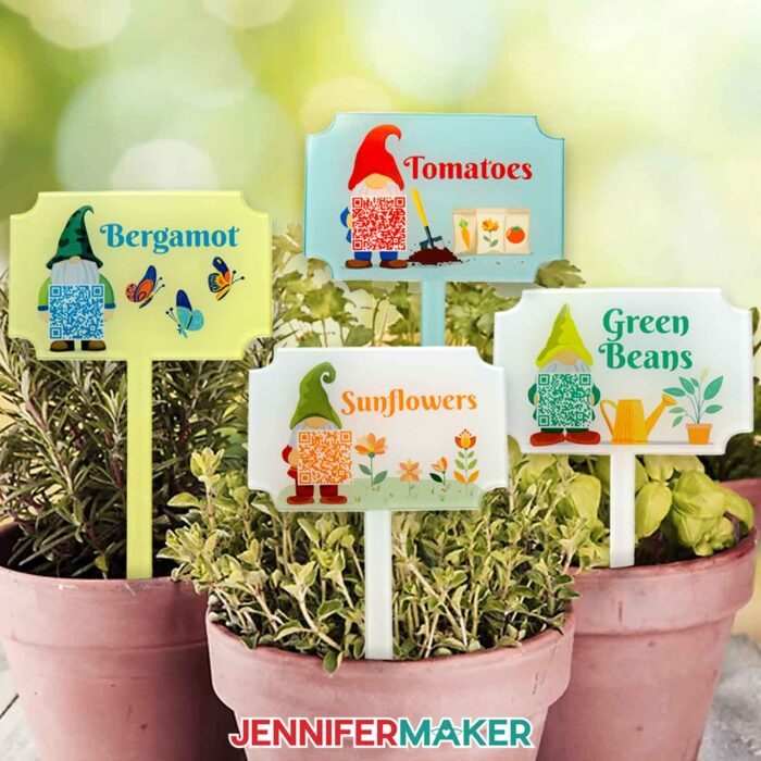Four plant care garden markers with gnome designs in potted plants, labeled for Bergamot, Tomatoes, Sunflowers, and Green Beans.