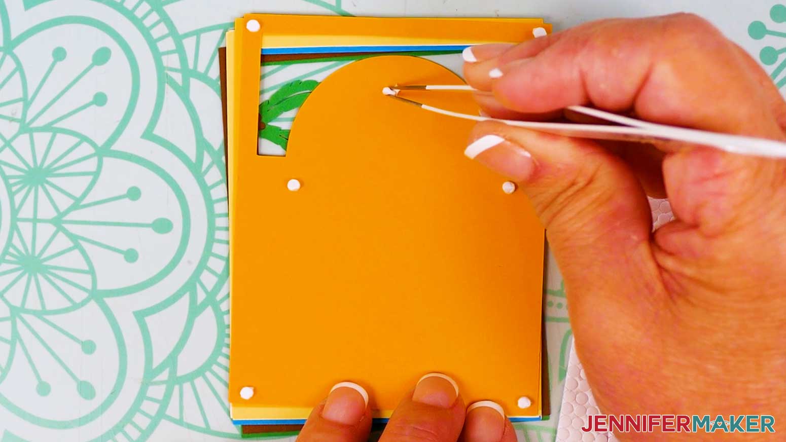 Use tweezers to place micro pop dots on the back of the second layer for the Polaroid Shadow Box.