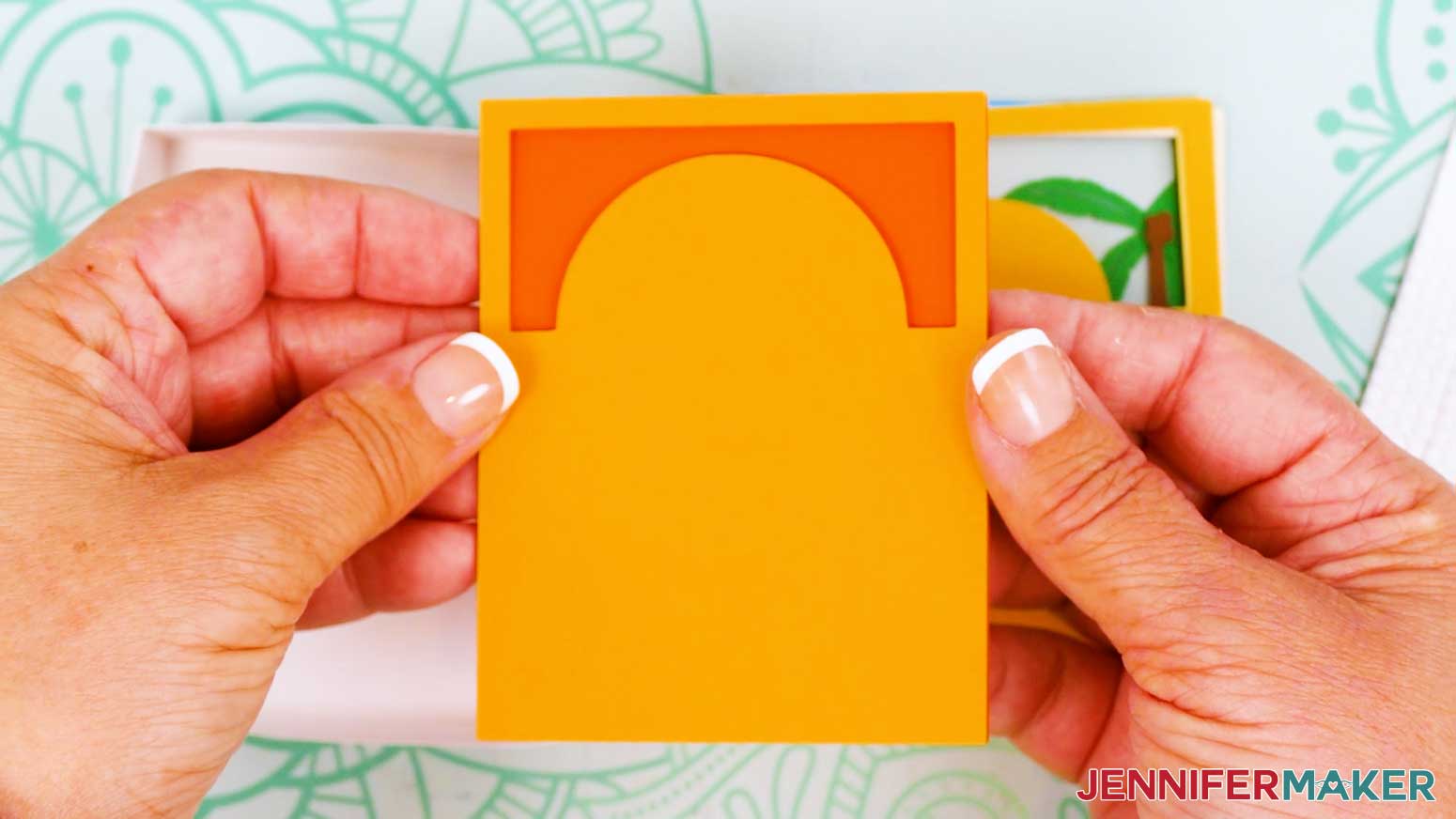 Take the attached layers out of the shadow box frame to make sure they're aligned and secured.