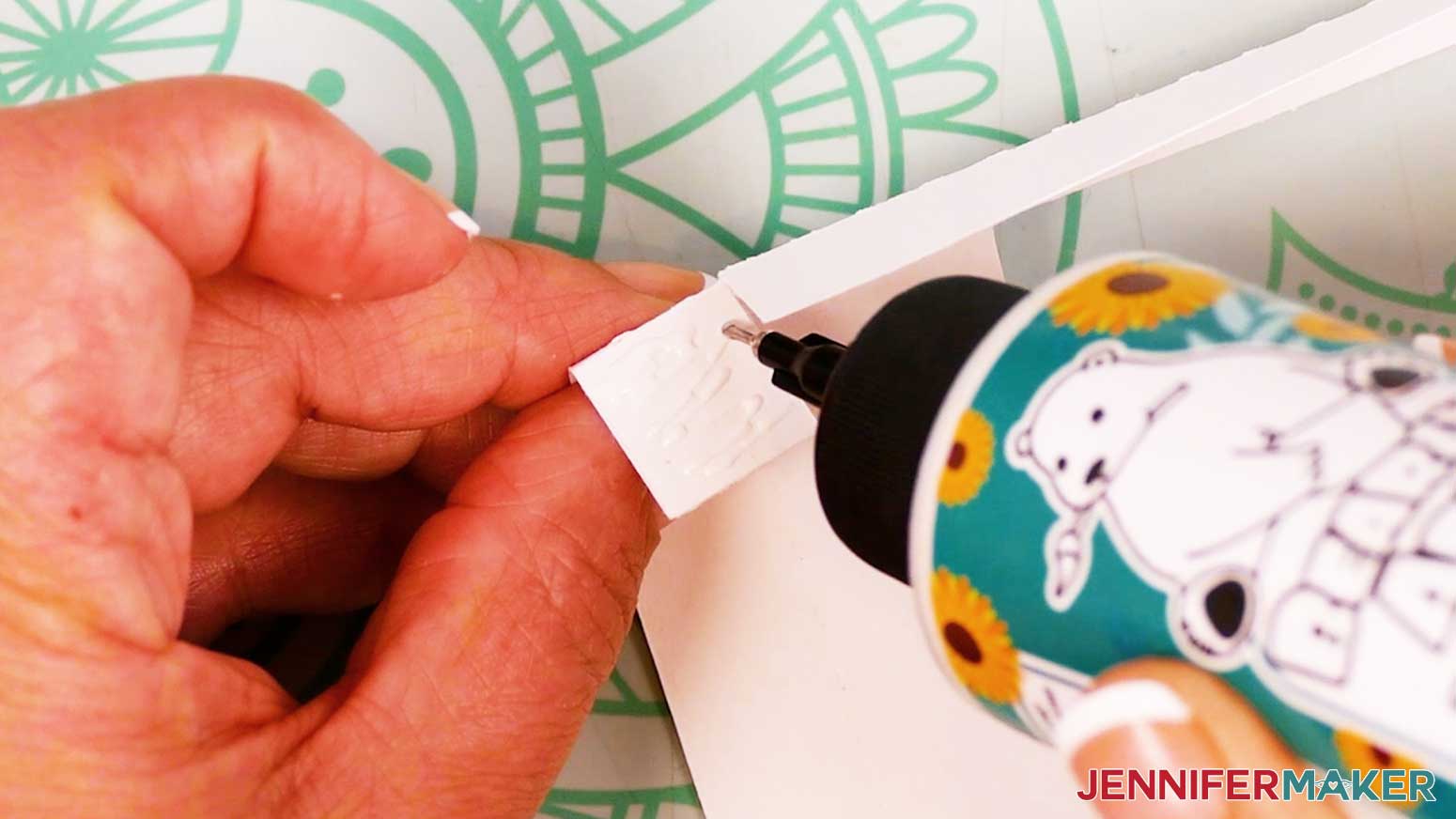 Glue the tabs of the Polaroid Shadow Box frame.
