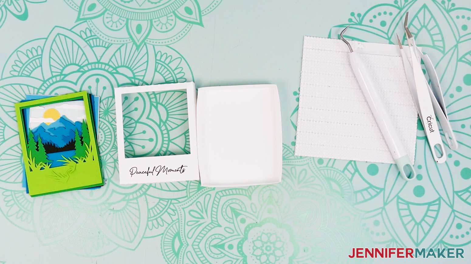 Cut cardstock pieces for the Polaroid Shadow Box mountain scene.