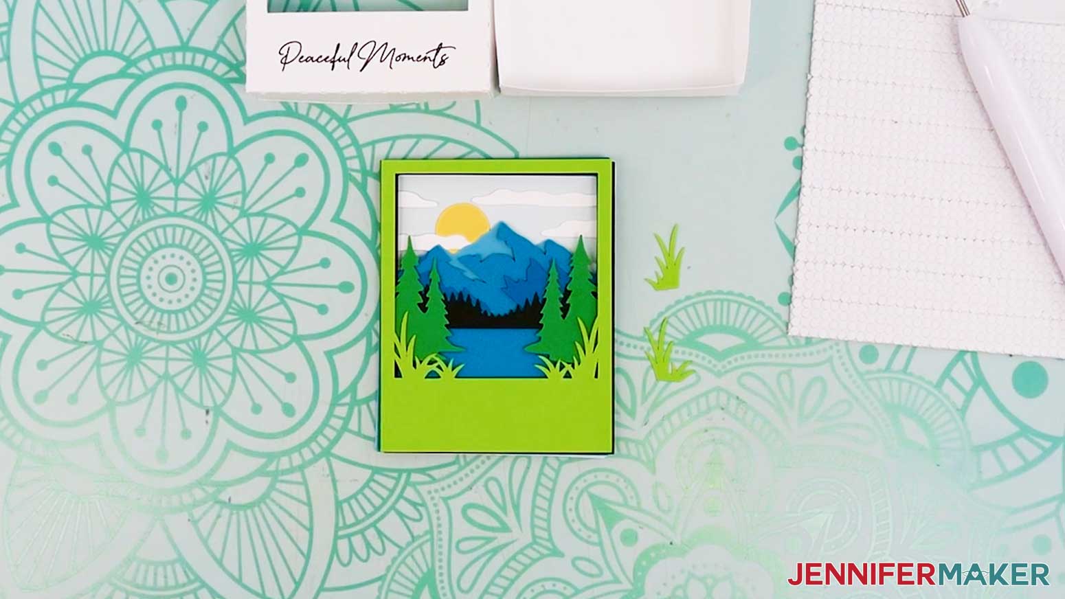 The cut mountain scene layers for the Polaroid Shadow Box, stacked in order.