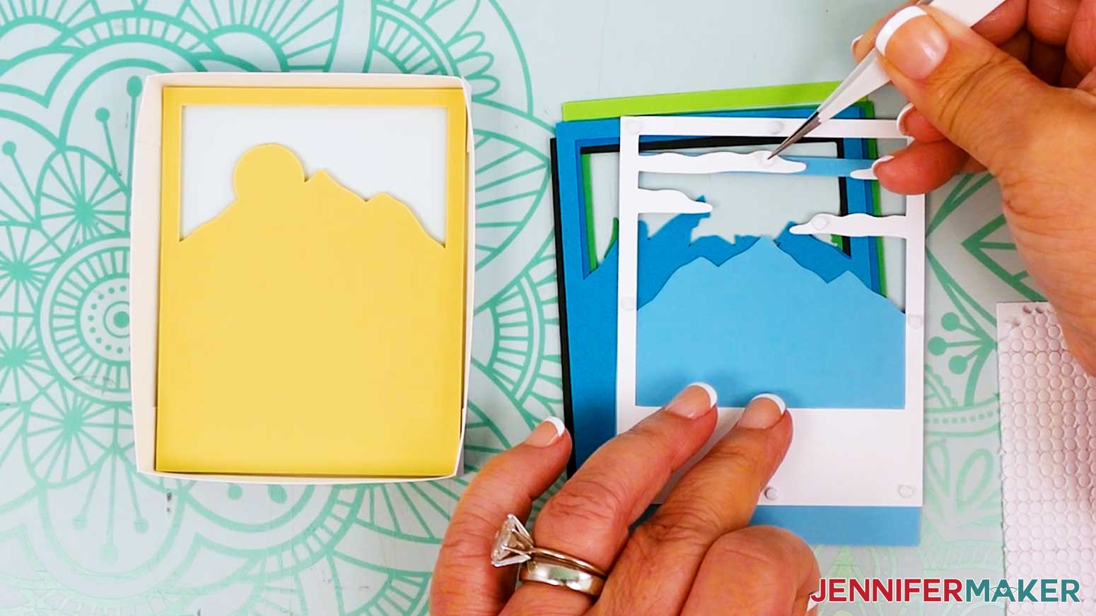Place a second micro pop dot on top of the first on the longest cloud for the Polaroid Shadow Box mountain scene.