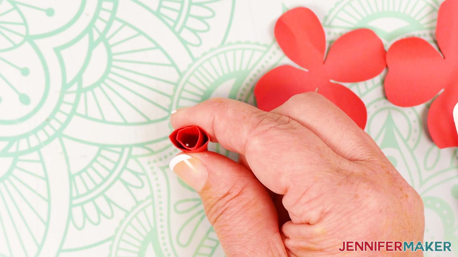 Glue the second two petals around the first two to finish the bud for the 3D pop-up spring flowers.