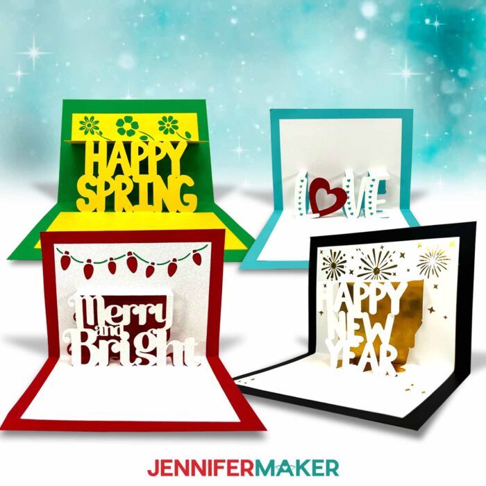 Learn to make a pop up letter card with this tutorial from JenniferMaker! Four pop up letter cards are on display against a teal and white background: a red and white card that says "Merry and Bright," a teal and white card that says "Love," a black and white card that says "Happy New Year," and a green and yellow card that says "Happy Spring."