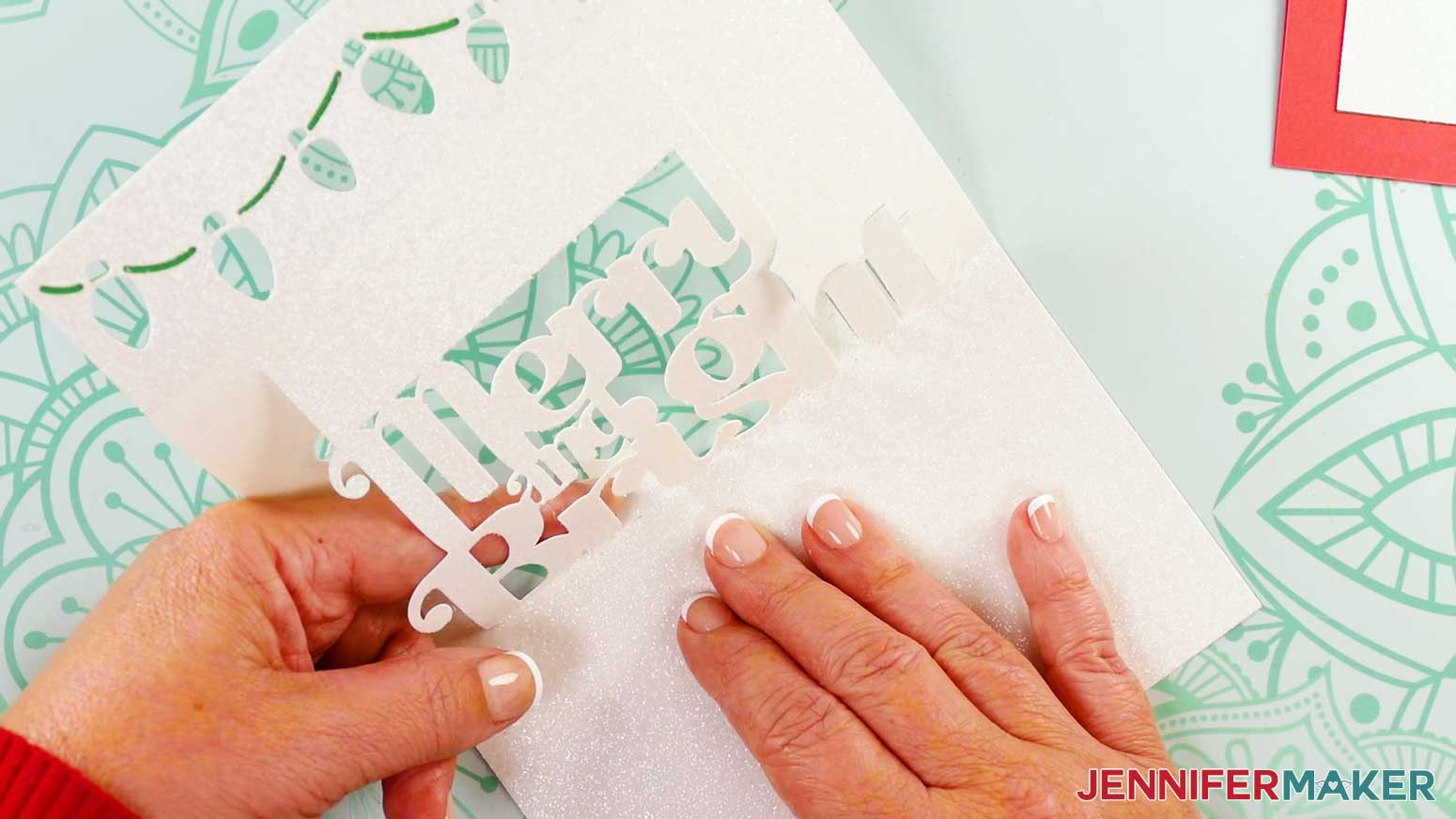 Folding the inner panel of the merry and bright pop up card