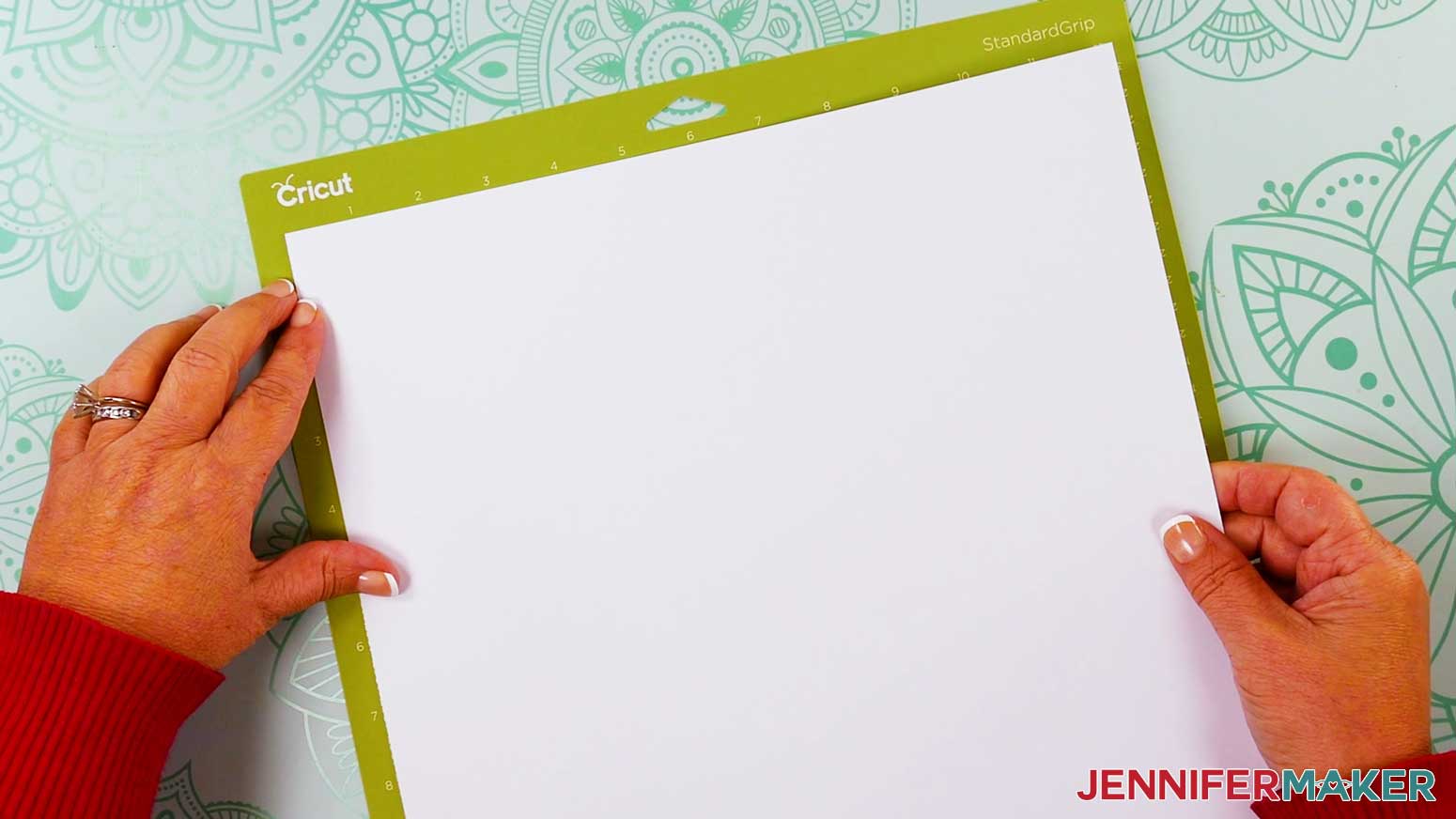 Place cardstock on green standard grip mat