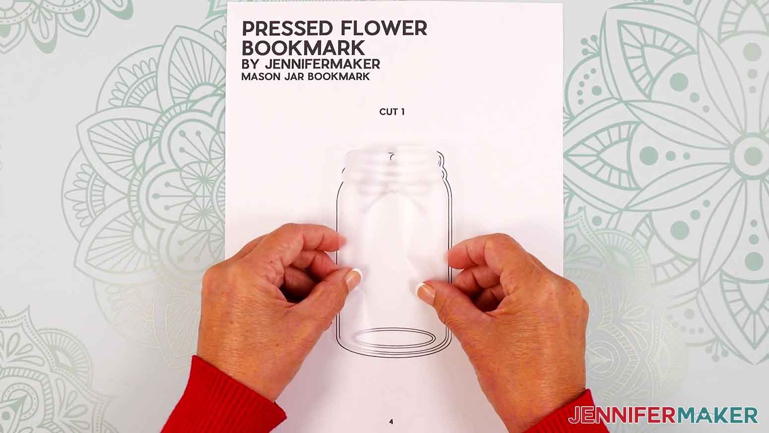 Place the cut piece of laminate on the corresponding design in the PDF printout.