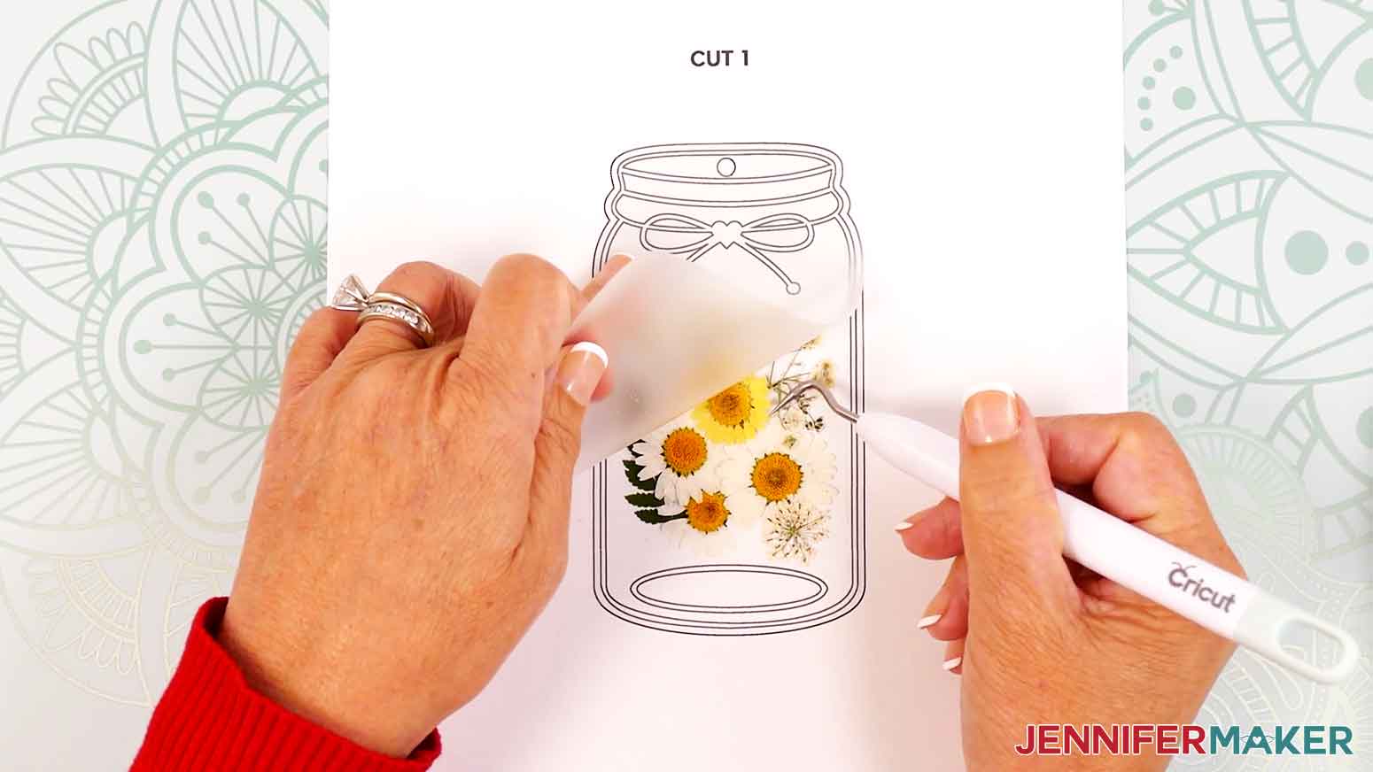 Use a weeding tool to nudge any flowers back into place to stay within the printed alignment areas.