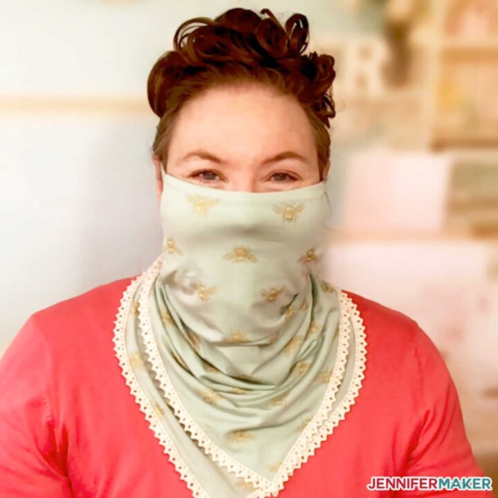 Jennifer wearing the pretty scarf face mask in mint green with off white trim