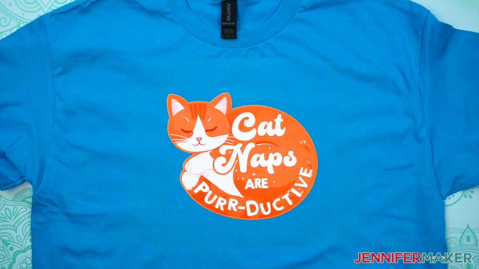 The cat design is pressed on the t-shirt.