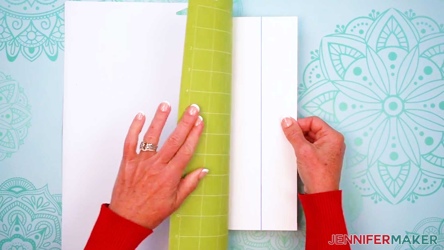 Flip the mat over and roll away the mat from the printable iron-on material.