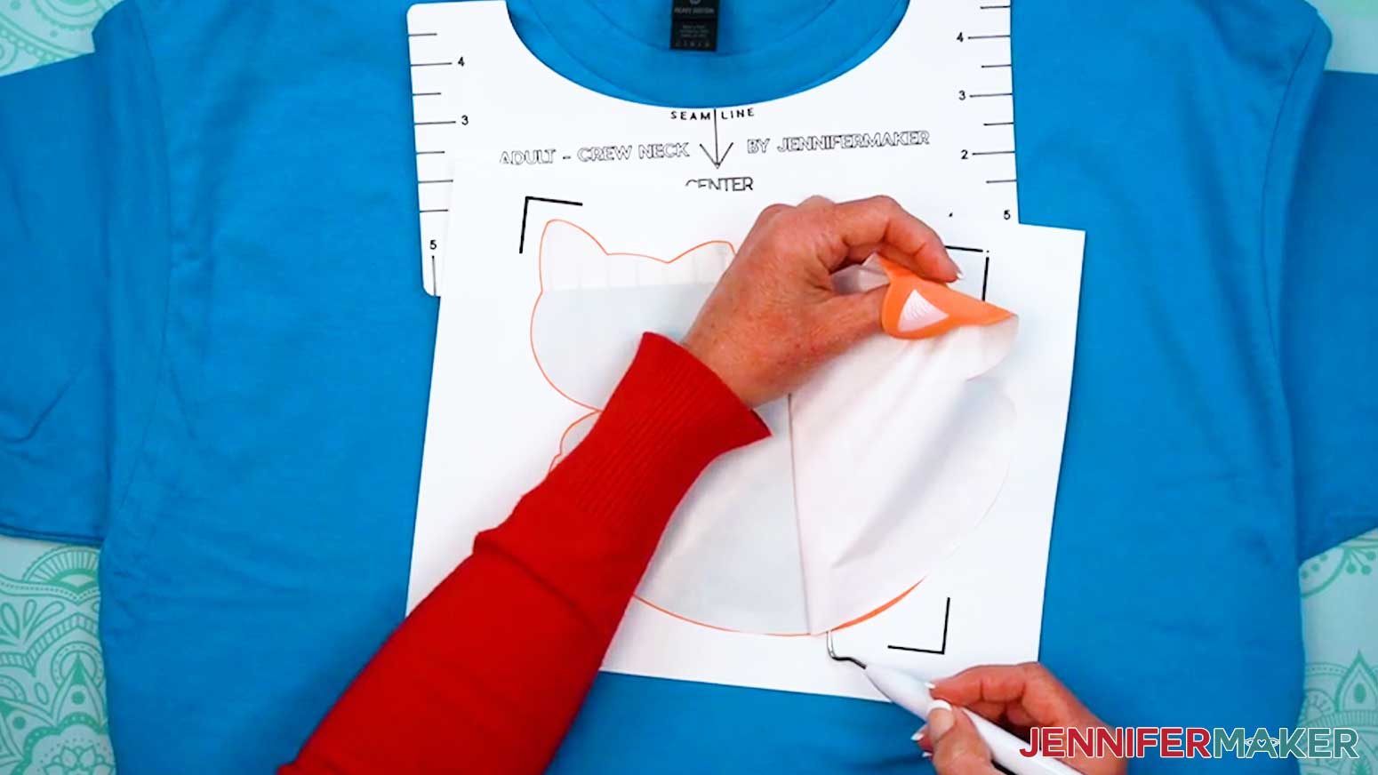 Use a weeding tool to gently remove the design from the excess material.