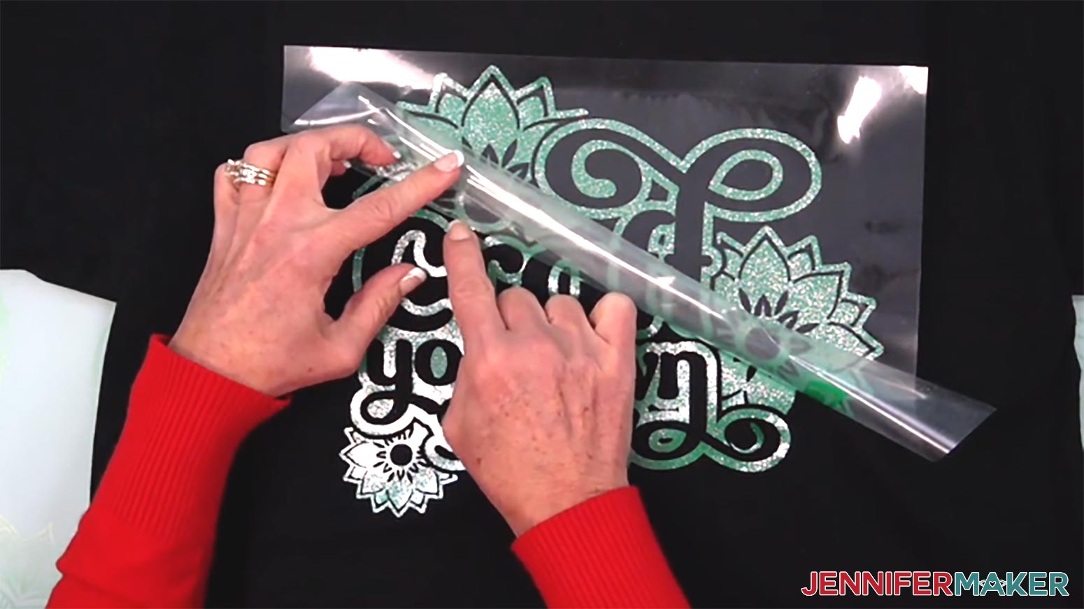 Make sure all the small pieces of the metallic puff vinyl design layers are tacked down while removing the carrier sheet after pressing.