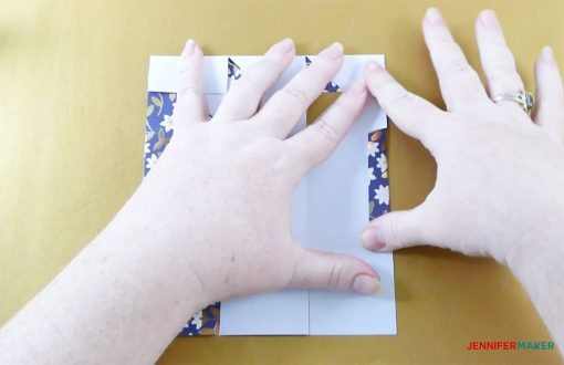 Folding in the tabs on the pull-up gift box
