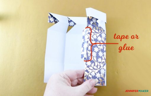 Tape or glue the two sides together in the middle of your pull-up gift box