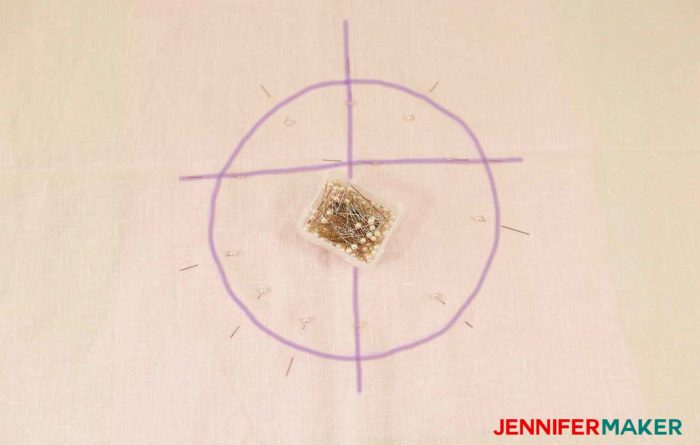 Pin the square facing to the fabric to sew a round jewel neckline on a shirt or tunic