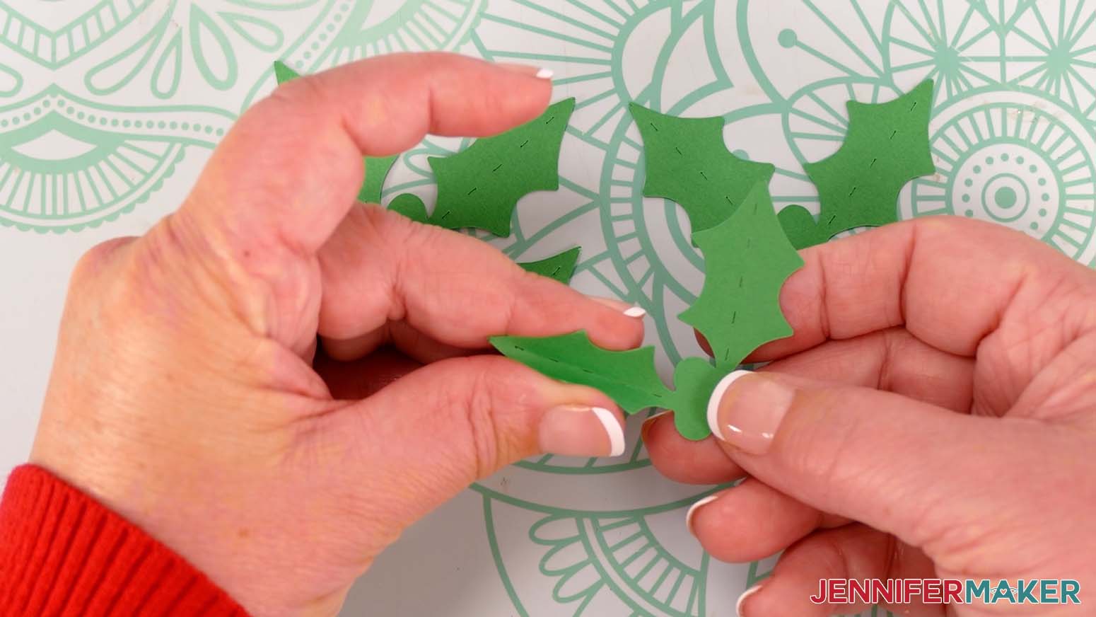 Fold upward along the holly leaf crease lines to give the Santa purse leaf accents dimension.