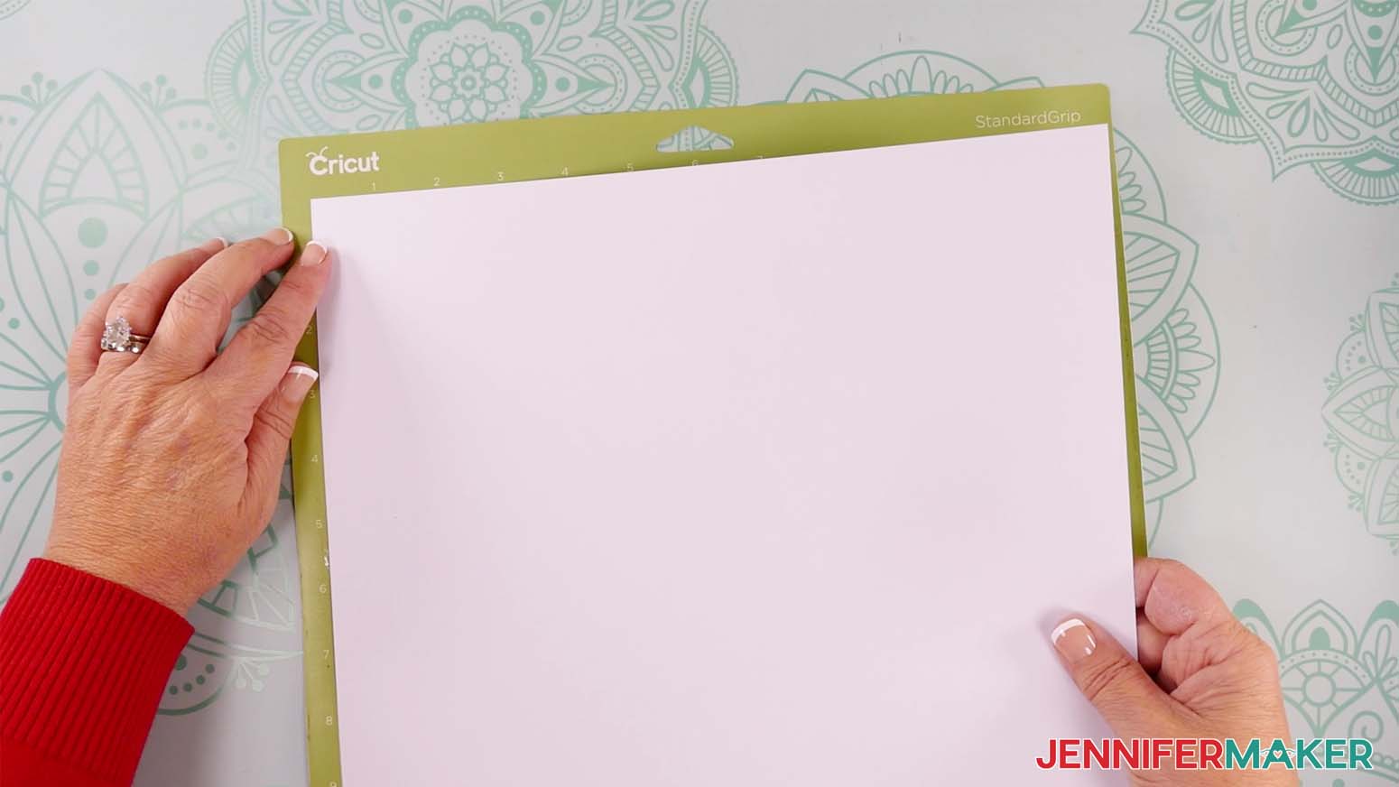 Place the cardstock on a green machine mat to make a shadow box with floating pieces