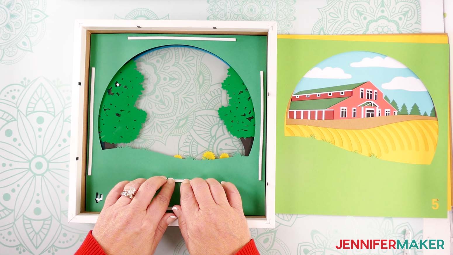 Add foam tape to the back of layer four to make a shadow box with floating pieces