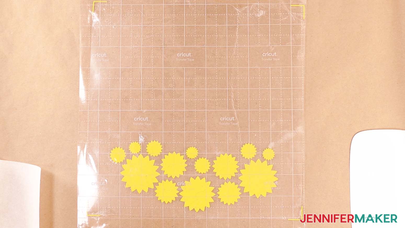 Make sure all four vinyl guide marks are aligned to the acetate corners before removing the transfer tape to make a shadow box with floating pieces