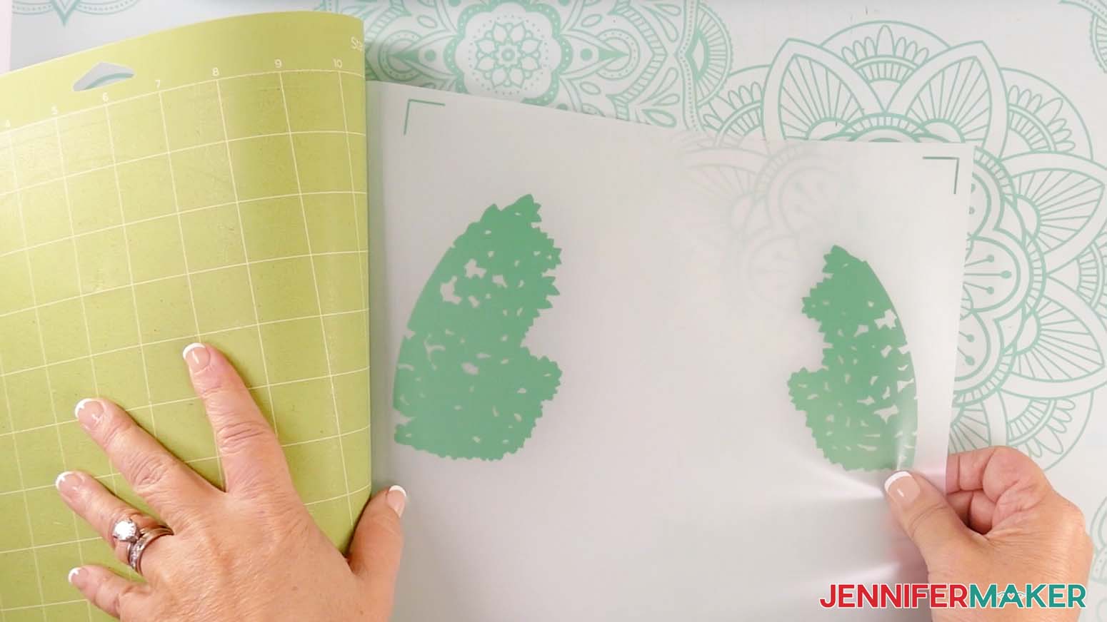 A weeded green vinyl layer used to make a shadow box with floating pieces