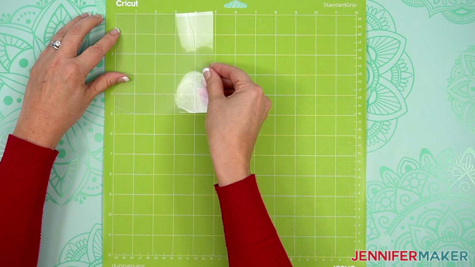 Place the acetate&rsquo;s side with the protective film down on a green StandardGrip machine mat