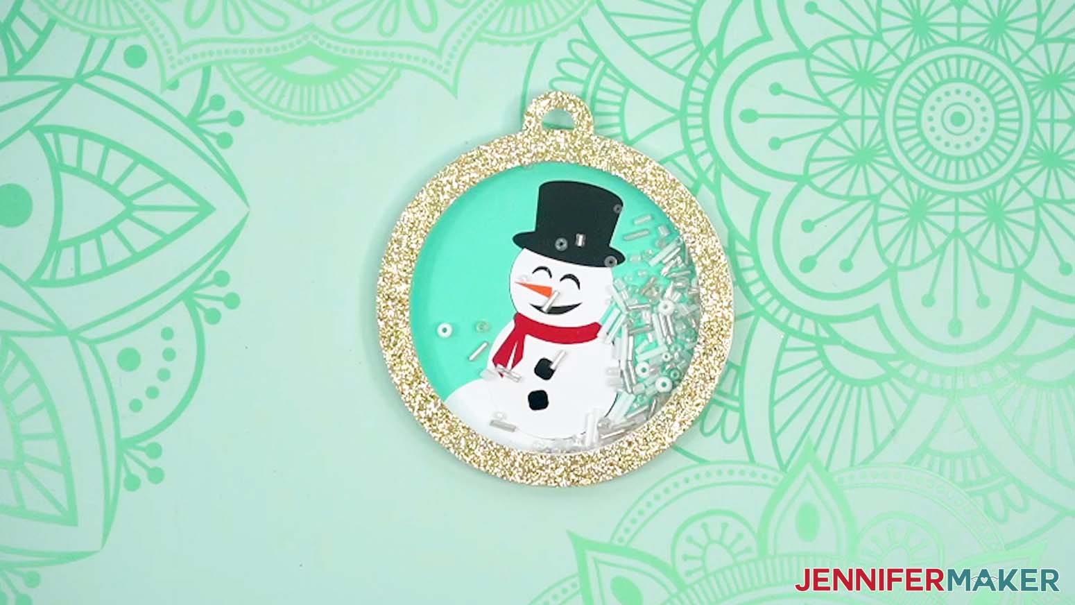 Assembled snowman shaker ornament design