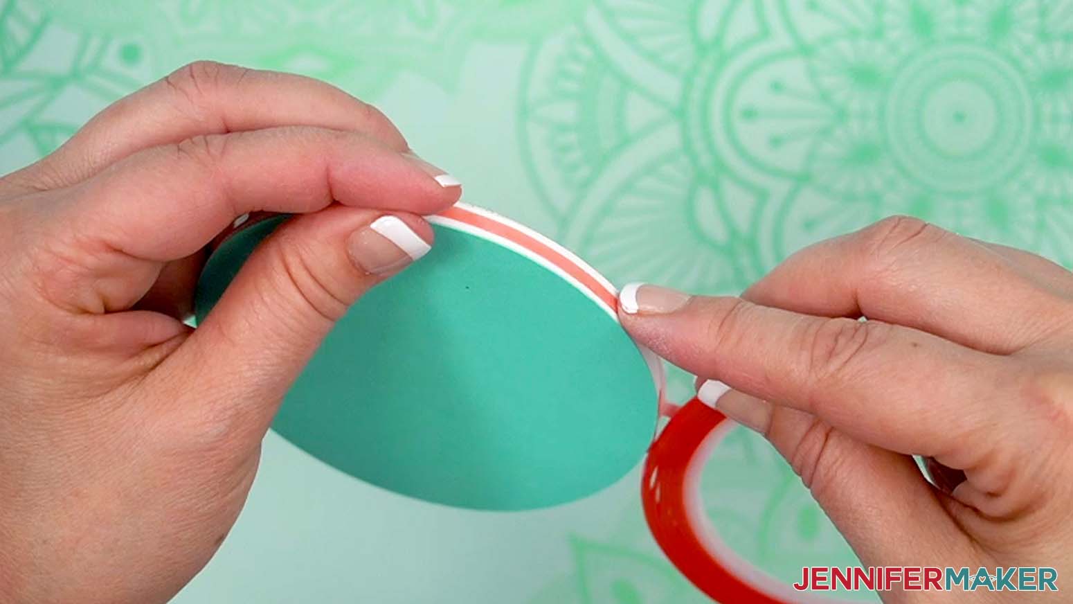 Thin red tape applied on outside of shaker ornament