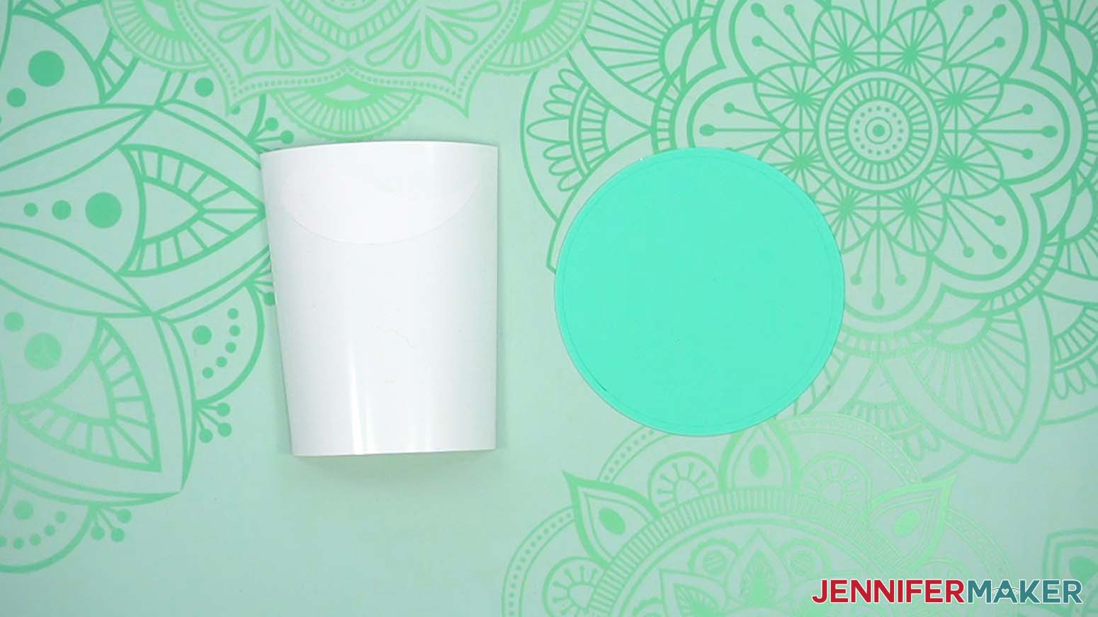 Cut white vinyl and teal cardstock circle