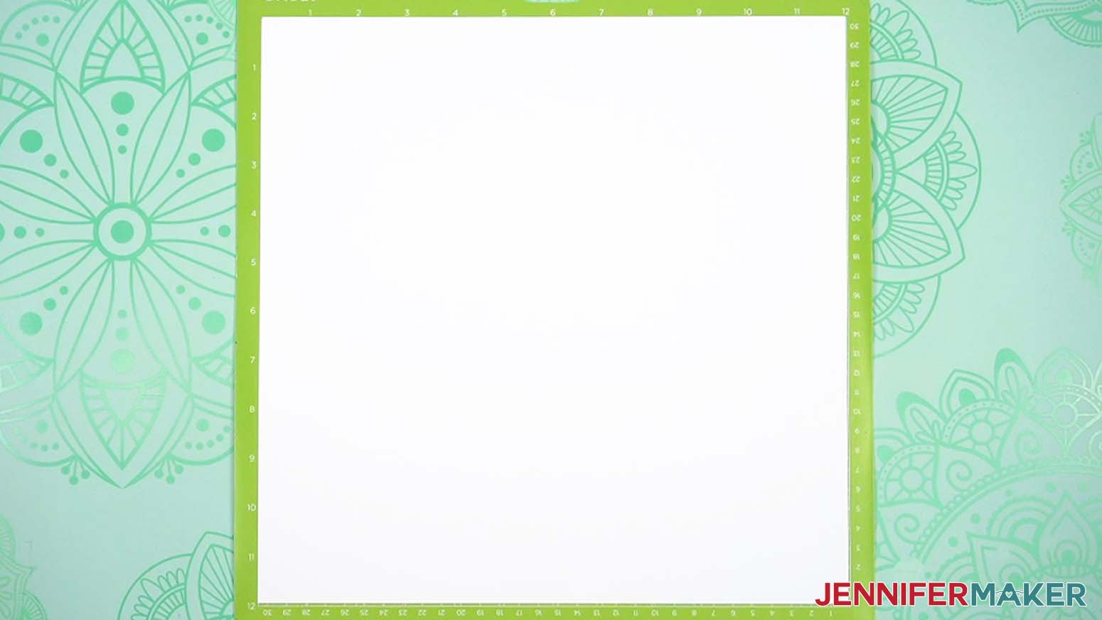 Place your cardstock face up on a green StandardGrip machine mat.