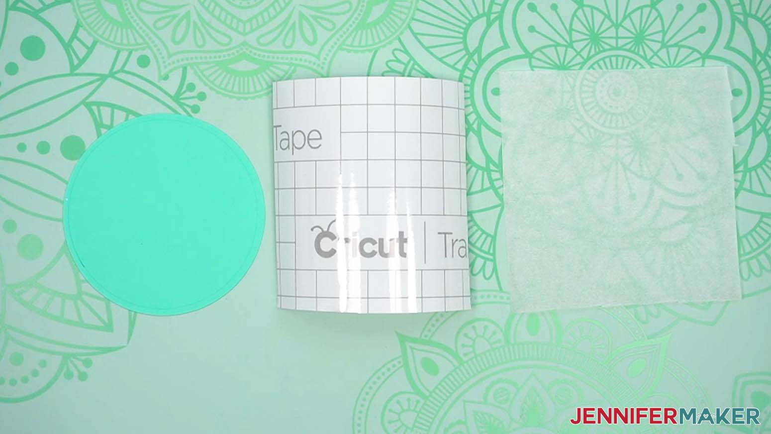 Cut pieces of cardstock, transfer tape and parchment paper