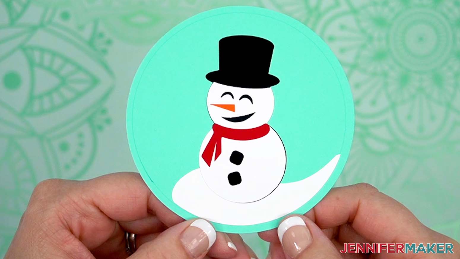 Snowman vinyl pieces adhered to cardstock base