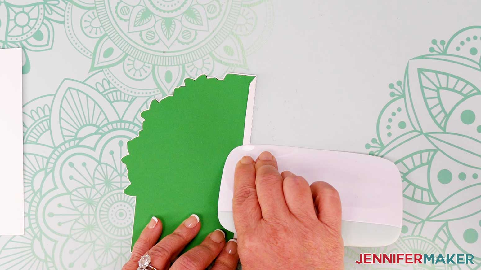Use a scraper to crease along the tab for the Joy-size tree shaped edge card