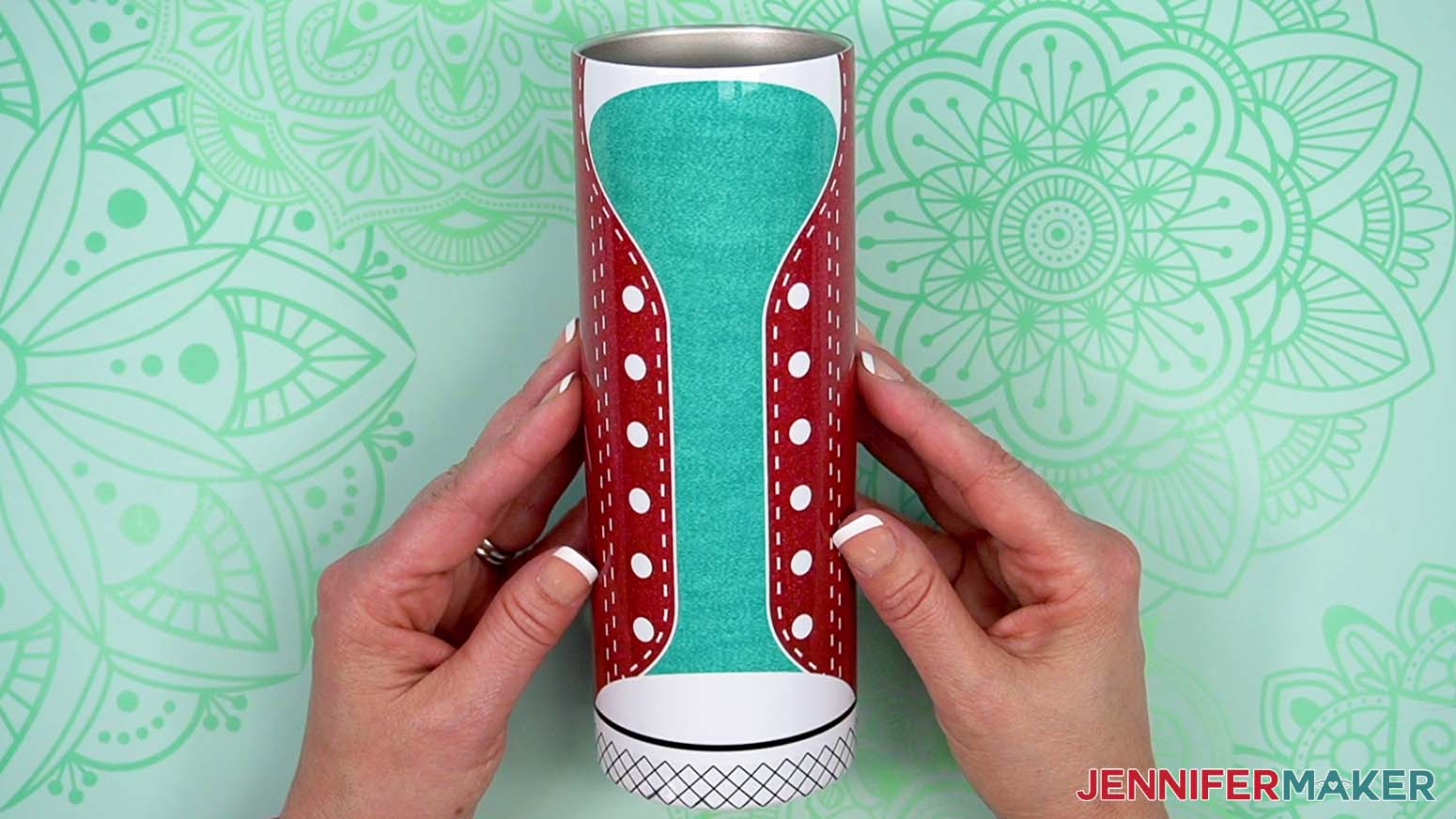The tumbler is sublimated and ready to embellish with the shoelace.