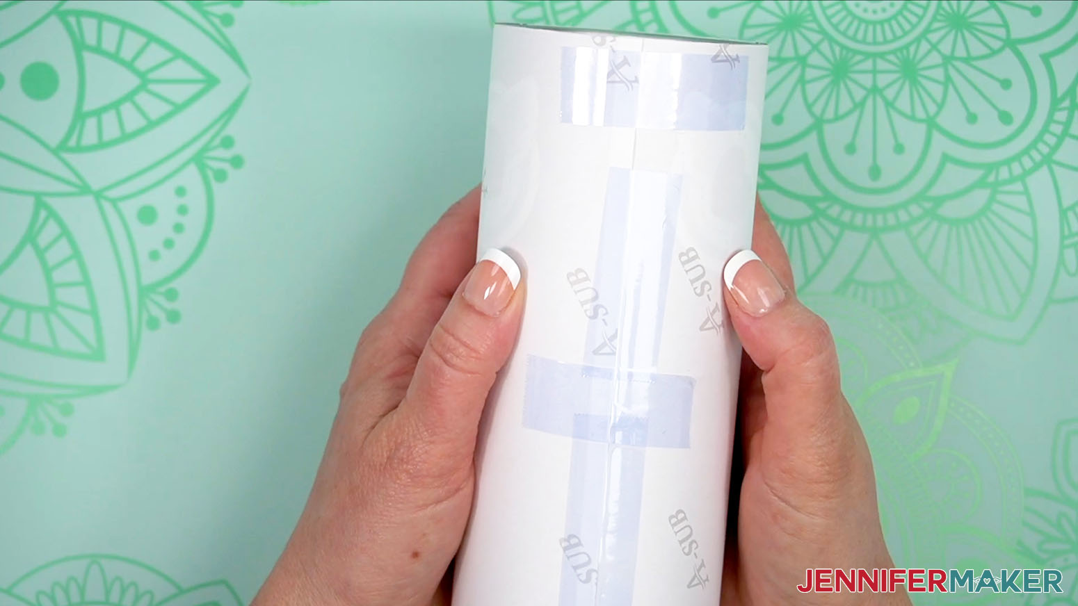 Test the tightness of your taped design by pushing on the paper to see if there are any gaps.
