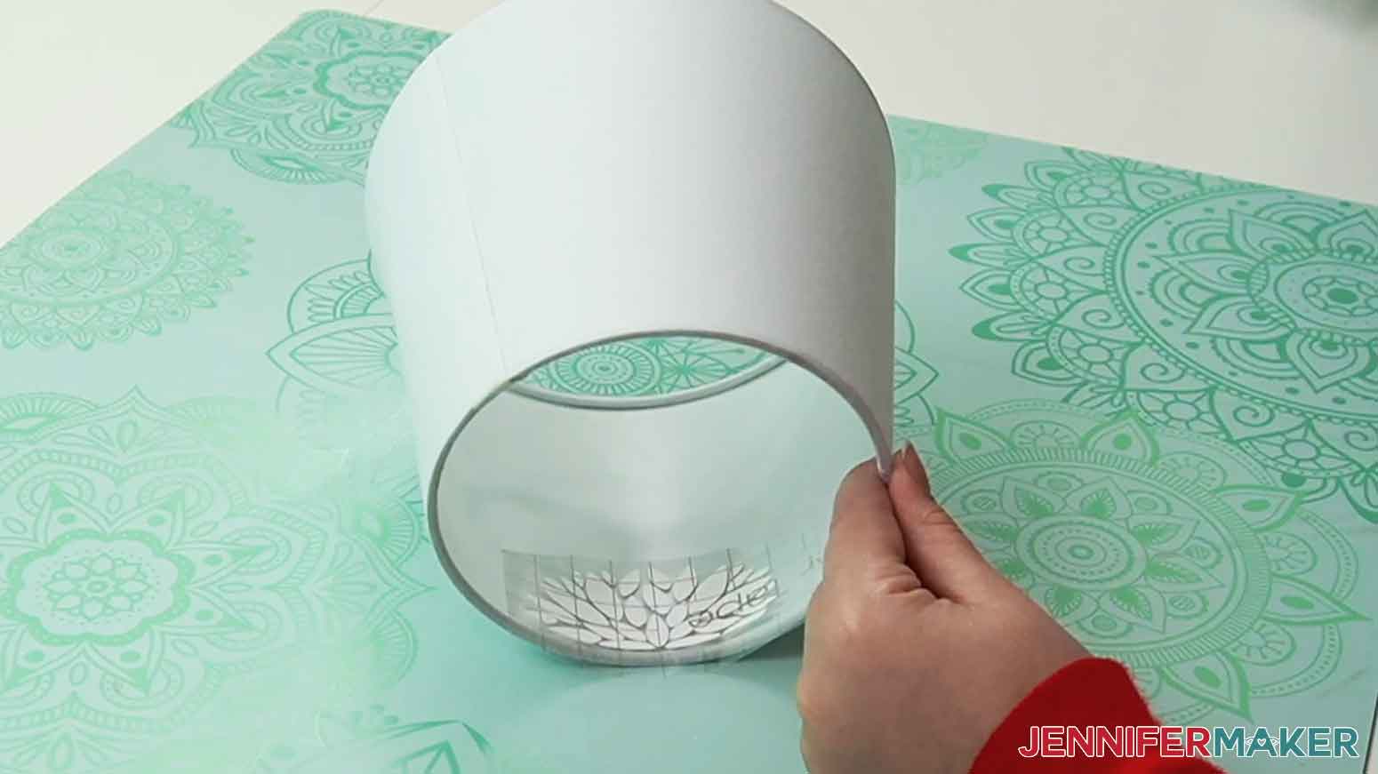 Apply the first dahlia along the upper top edge inside the tapered lampshade.