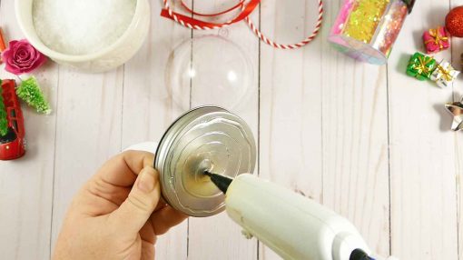 Glue the paper to the lid of your Mason jar