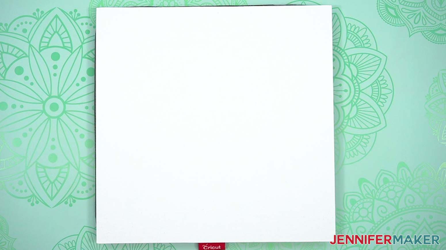 Place white canvas textured-side up on a pressing mat
