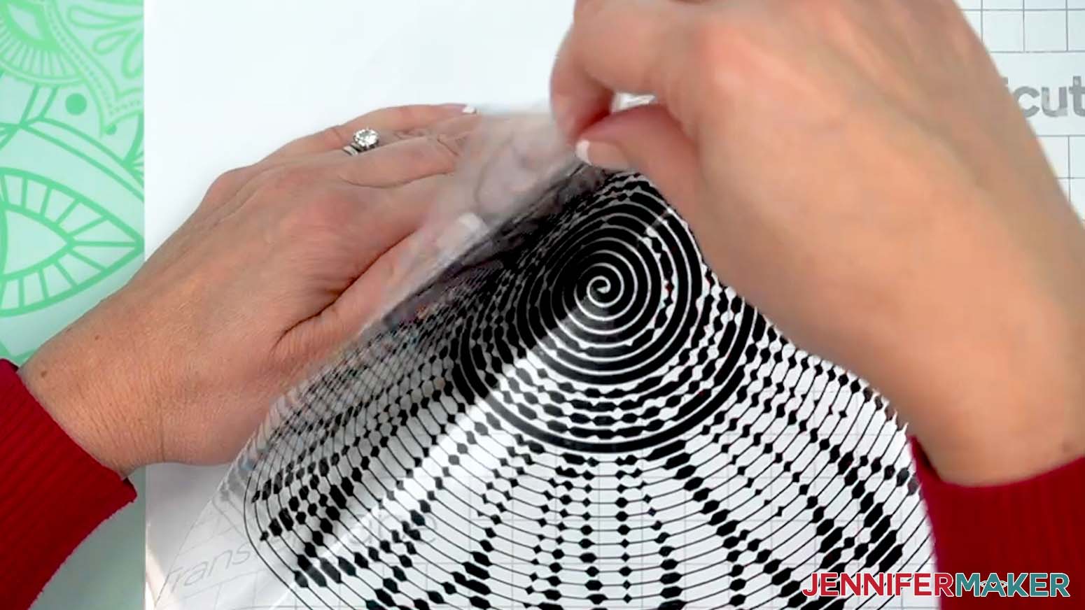 Gently peel back the carrier tape from the vinyl.