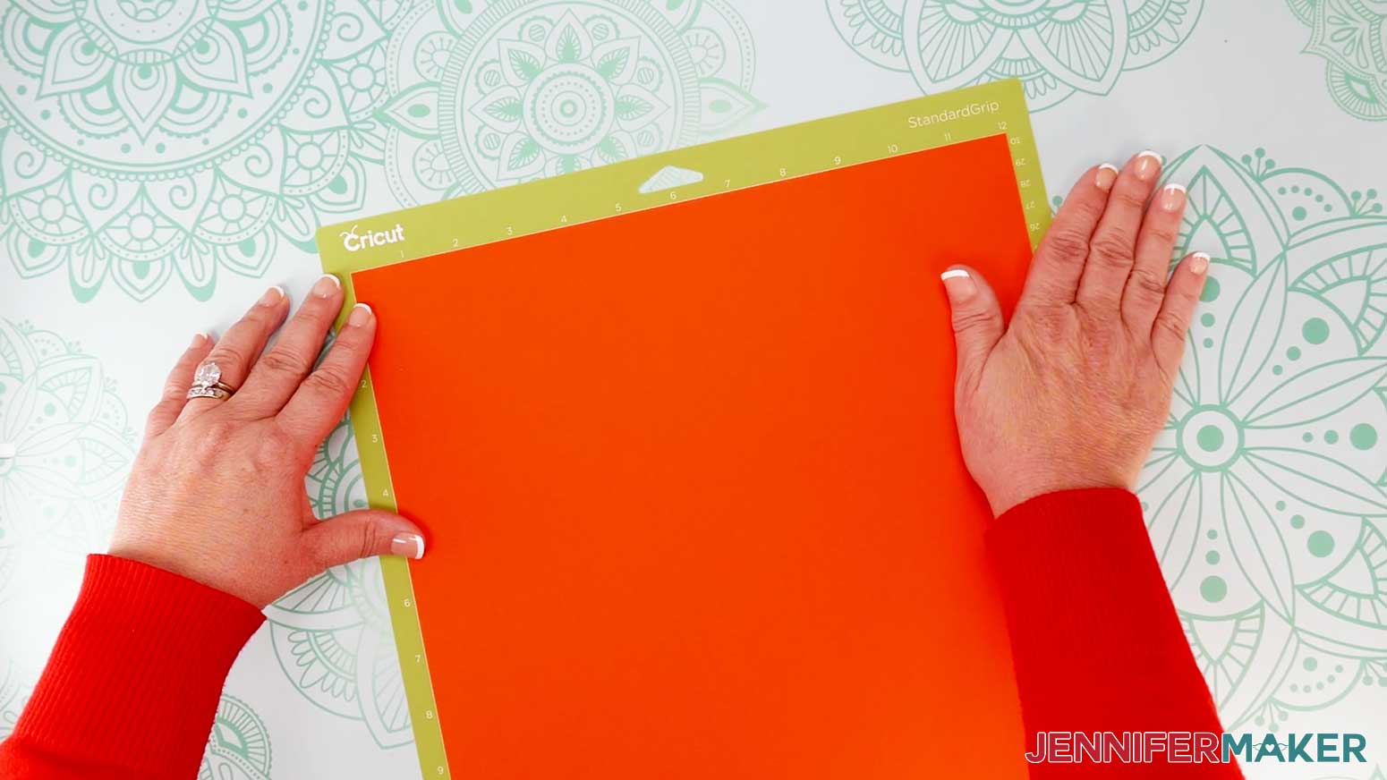 Place your first mat&rsquo;s material face up on a green StandardGrip machine mat.
