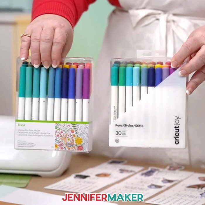 Jennifer shows off the Cricut pens she used to write the dates on her Stacked Calendar project in her craft room