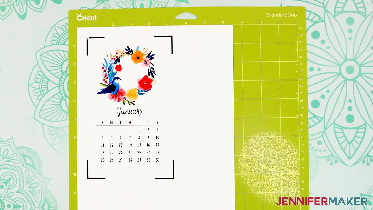 Place the printed uncut stacked calendar page onto a Cricut machine mat for cutting.