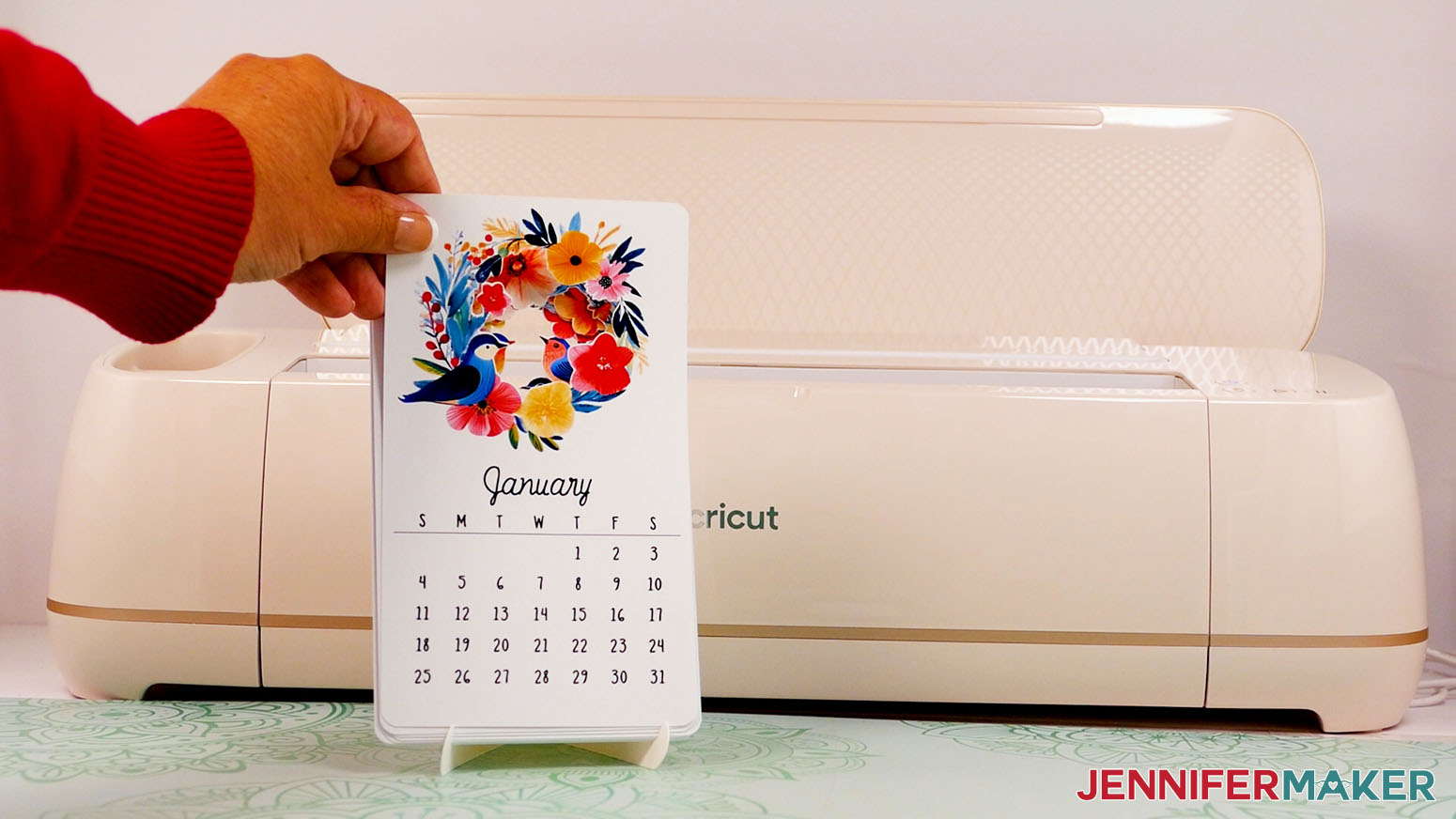 Place the completed stacked calendar onto the stand for display.