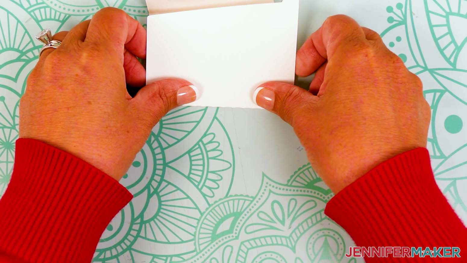 Fold each of the panels of the stacked calendar stand to form the correct shape.