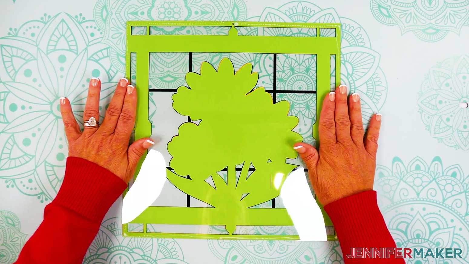 Adhere the acetate layer to the back of the stained glass design.