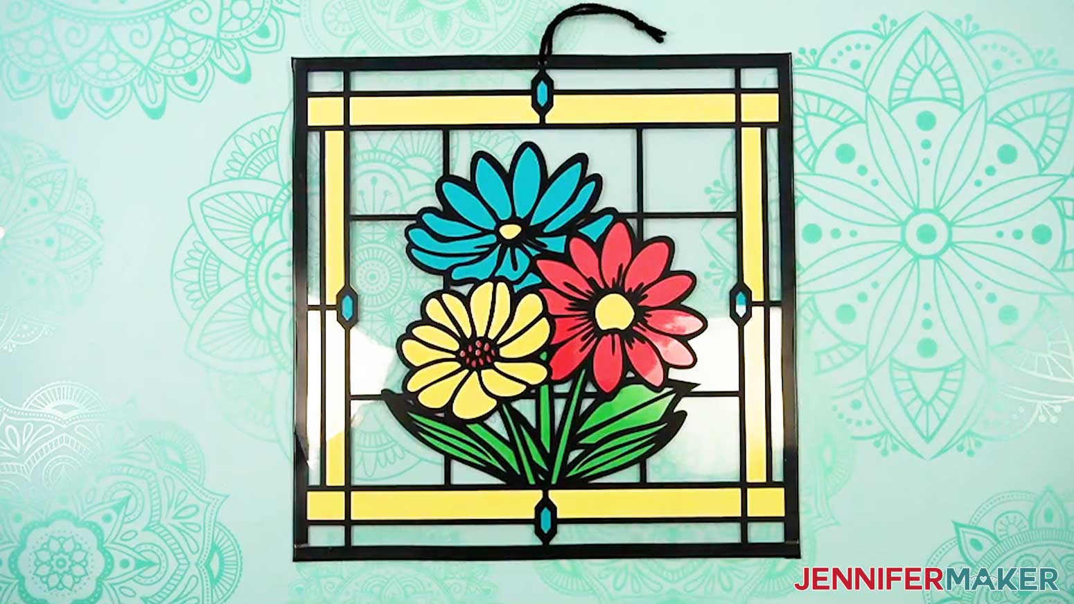 Glue your acetate layers to the cardstock to finish your two-sided stained glass project.