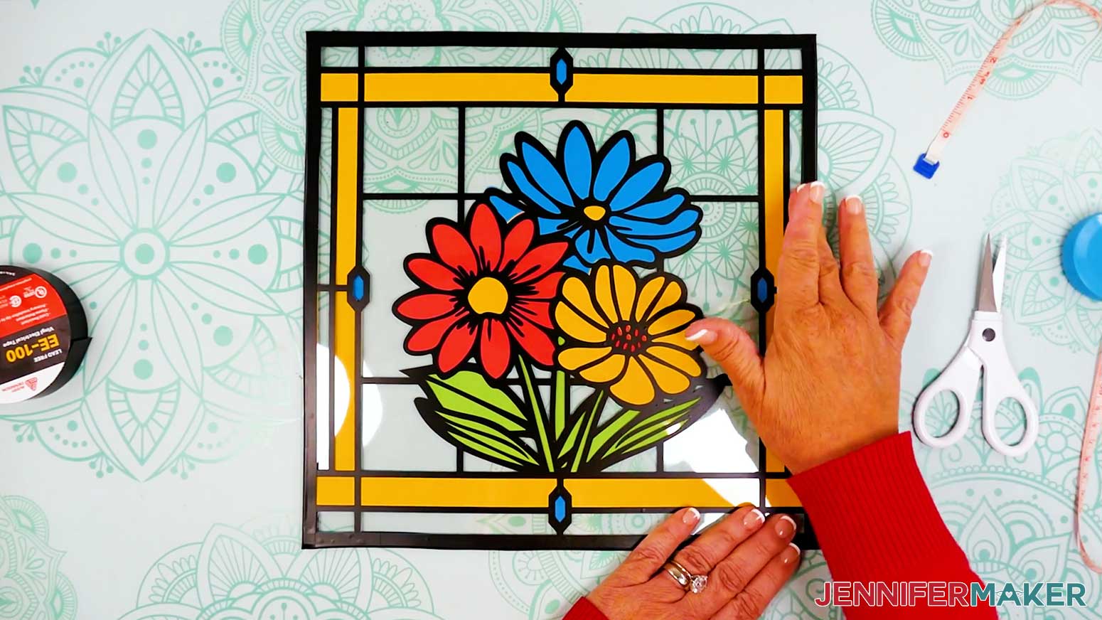 Place vinyl tape on each edge of the stained glass design.
